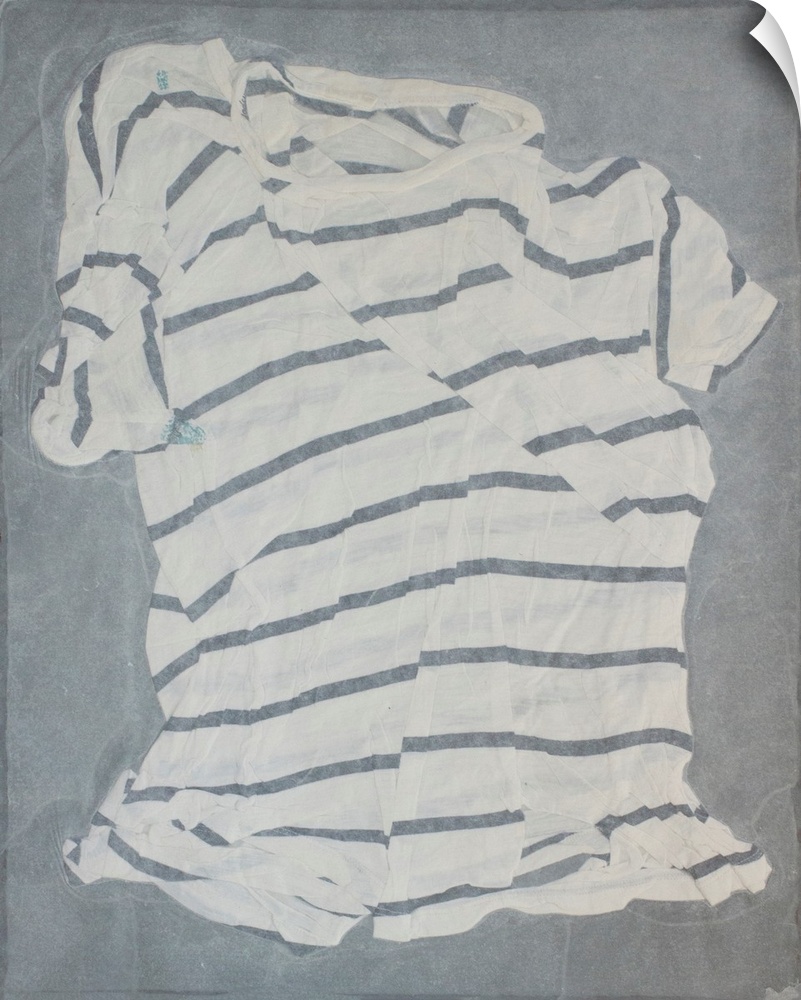 A striped, torn and mended t-shirt suspended in handmade paper.