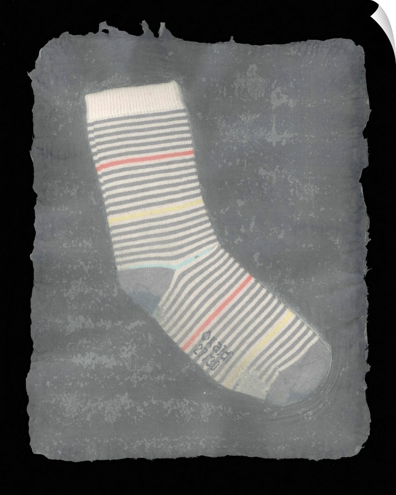 A worn, striped children's sock suspended in handmade paper.