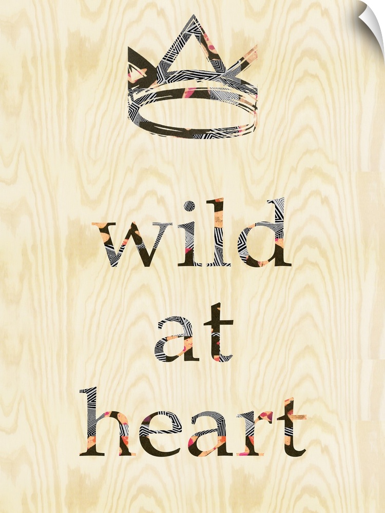 "Wild at heart" with a crown design on woodgrain.