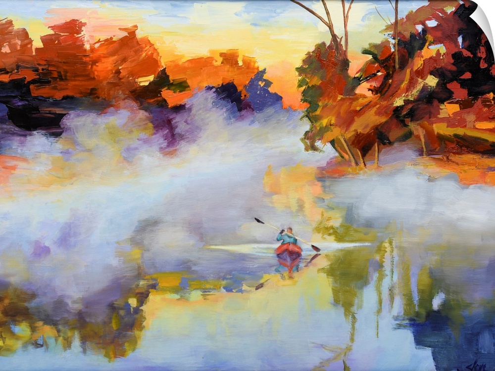 Kayaker paddling in the morning mist on a lake.