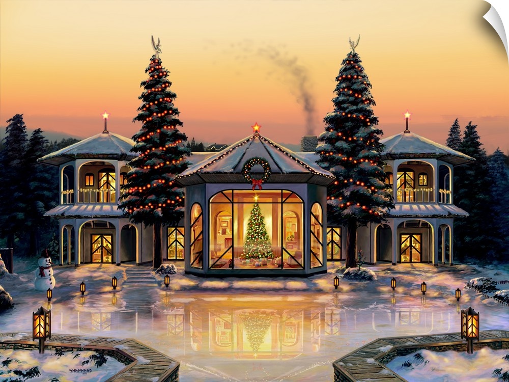 Under an orange and gold winter sunset a lavish dream home waits decorated for the season.