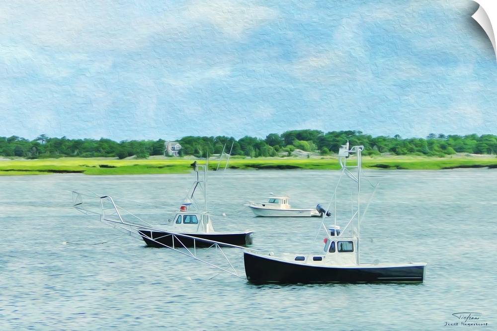 Three fishing boats on the water near the coast in New England.