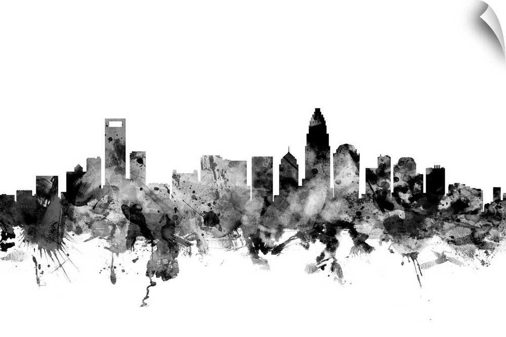 Contemporary artwork of the Charlotte city skyline in black watercolor paint splashes.