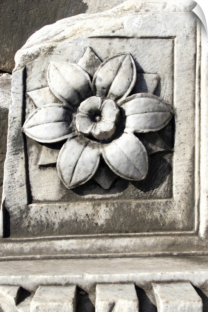 Marble, travertine, decoration representing a flower. Follen to the ground from arch or temple ceiling.
