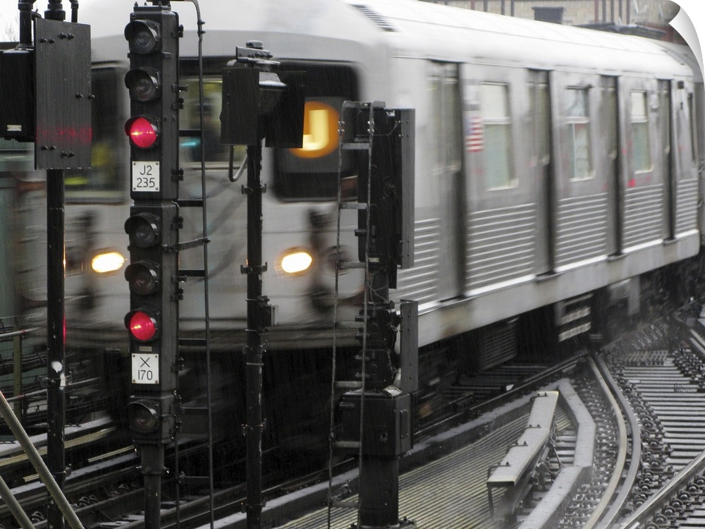 Photograph taken of a subway train while it is in motion.