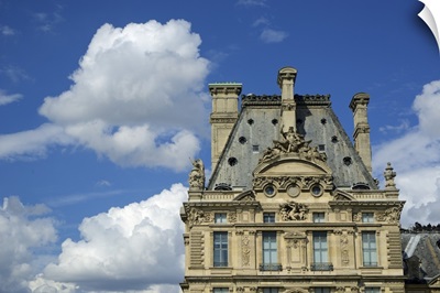 The Louvre Museum in Paris, France, on a cloudy day