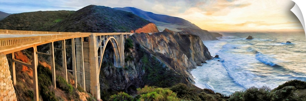 The Bixby Bridge is aglow with light from the setting sun, which also reflects off the surface of the ocean and draws fort...