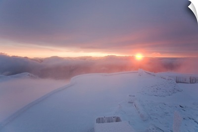 A colorful sunrise on the summit of Mt. Washington