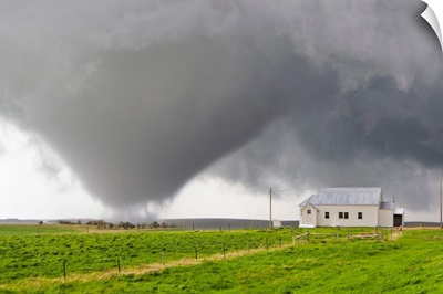 A powerful tornado approaches a church and just misses hitting it