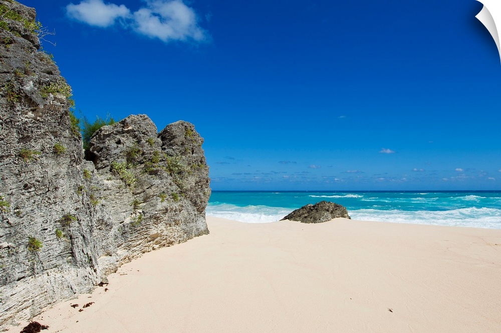 A rock cliff at a small beach on the south side of Bermuda.