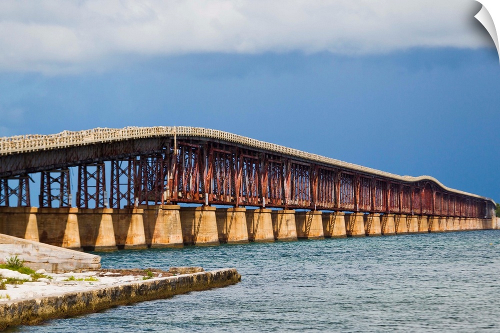 The old and retired Bahia Honda Bridge was built by Henry Flagler as part of the Overseas Railroad which was completed in ...