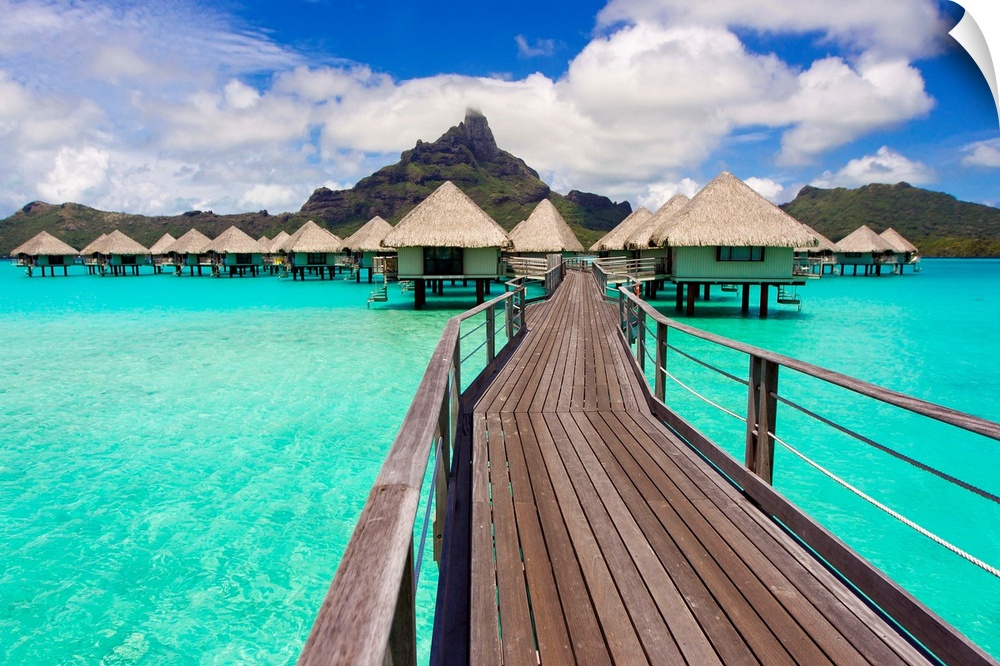 Boardwalk to the overwater bungalows at the Le M..ridien resort in Bora Bora in the French Polynesian islands.