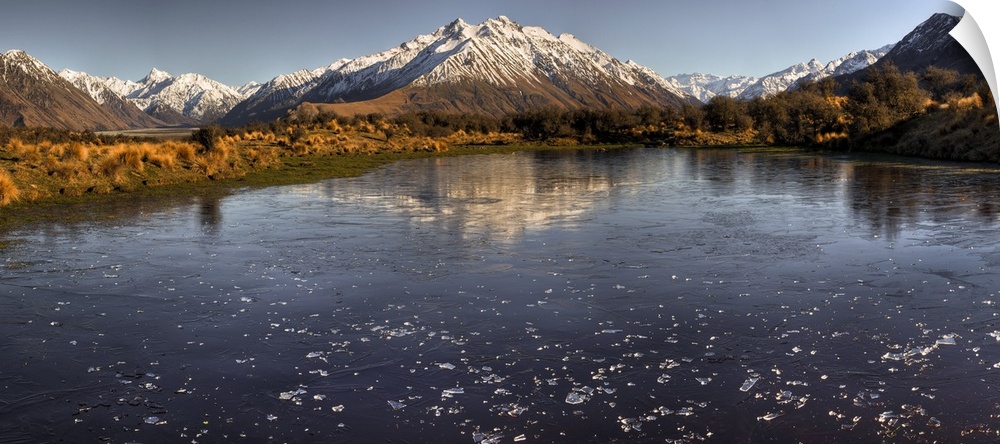 Frozen tarn covered in ice chips, panorama looking up Rangitata river valley, from Mt Sunday, (Edoras village, Kingdom of ...