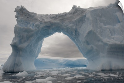 Iceberg with a natural arch, Antarctic Peninsula, Antarctica