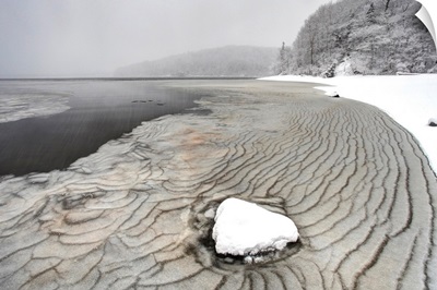 Pleated ice along lake shore in winter, Nova Scotia, Canada