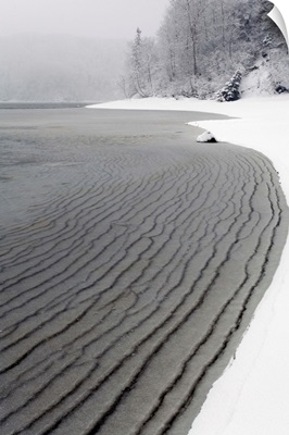 Pleated ice along lake shore in winter, Nova Scotia, Canada