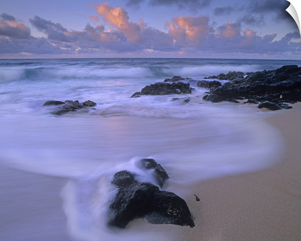 Rolling waves at dusk at Sandy Beach, Oahu, Hawaii
