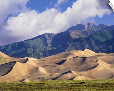 Sand dunes with Sangre de Cristo Mountains in the background, Colorado