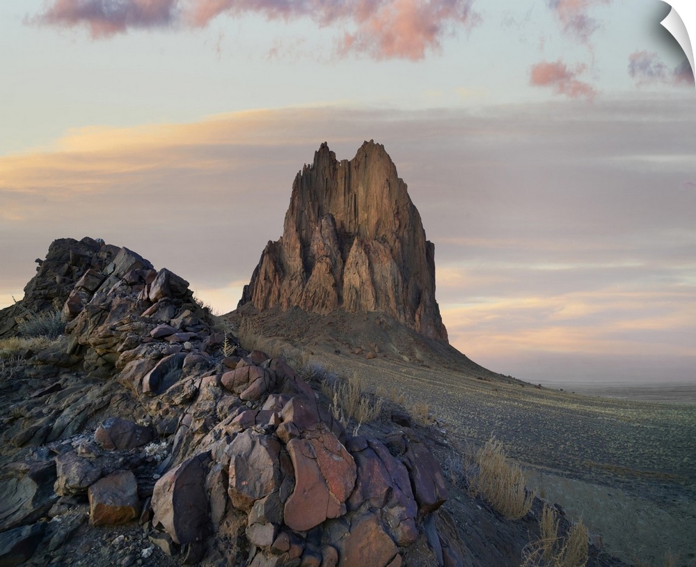 Ship Rock at sunset, remnant basalt core of extinct volcano, New Mexico