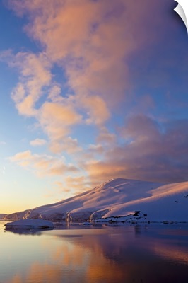Sunset over coastal mountains, Lemaire Channel, Antarctica