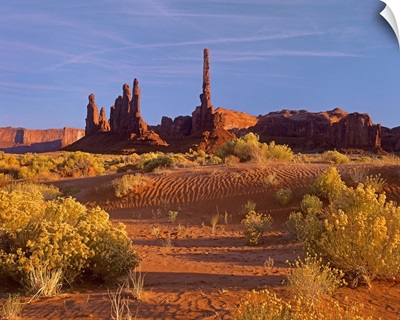 Totem Pole and Yei Bi Chei with sand dunes and shrubs, Monument Valley, Arizona
