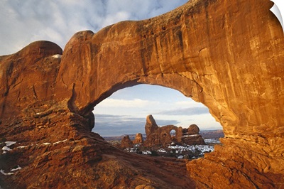 Turret arch through north window arch Arches National Park Utah
