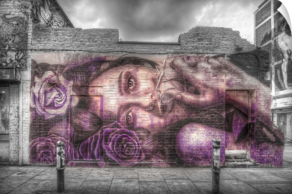 HDR photograph of an urban wall with graffiti on it.