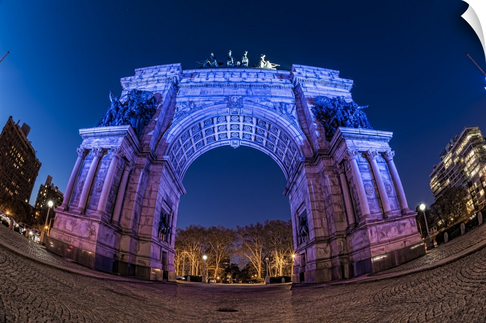 A photograph using a fisheye lens to capture an interesting ground level view of the Soldiers and Sailors Arch in NYC.