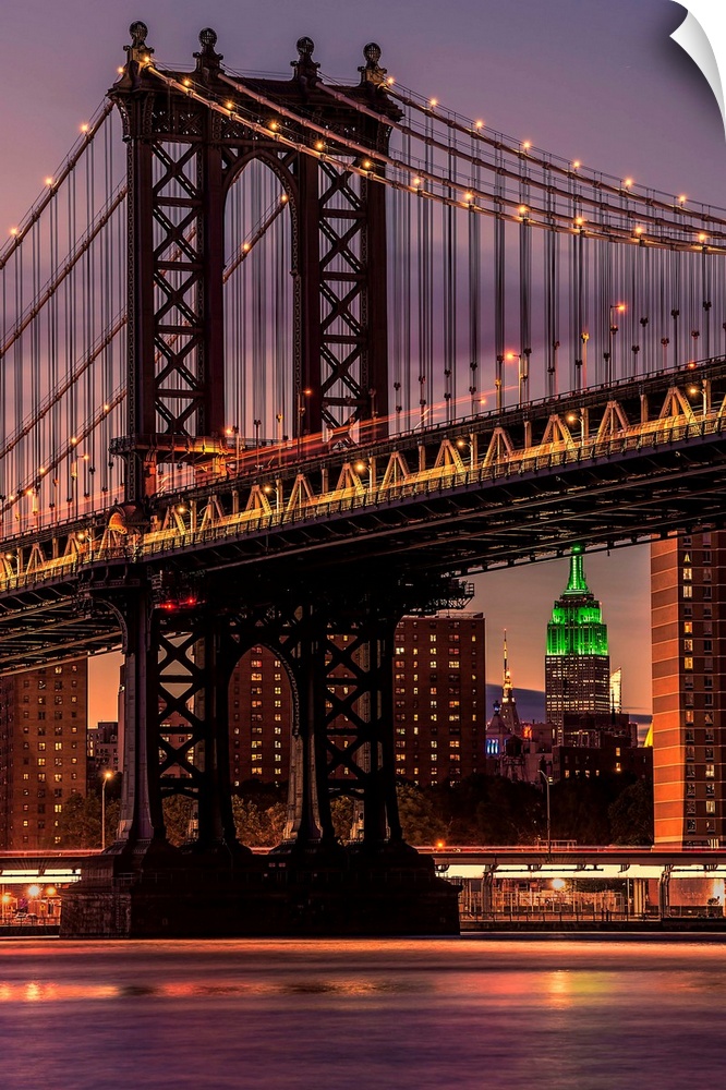 A photograph of the Manhattan bridge at twilight.