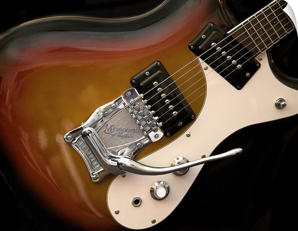 Close-up photograph of an electric guitar.