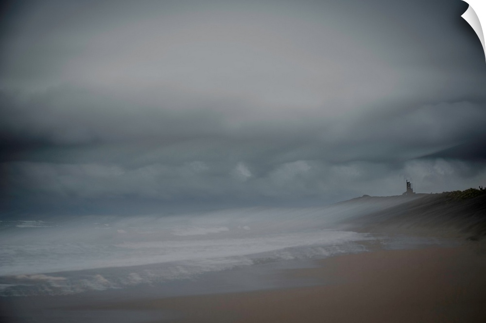 Landscape photograph of the beach on an overcast day, created with multiple exposures.