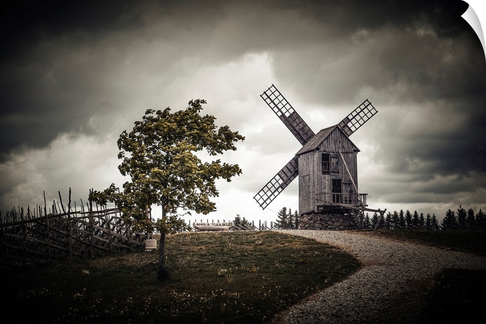 An old windmill in a contrasting landscape