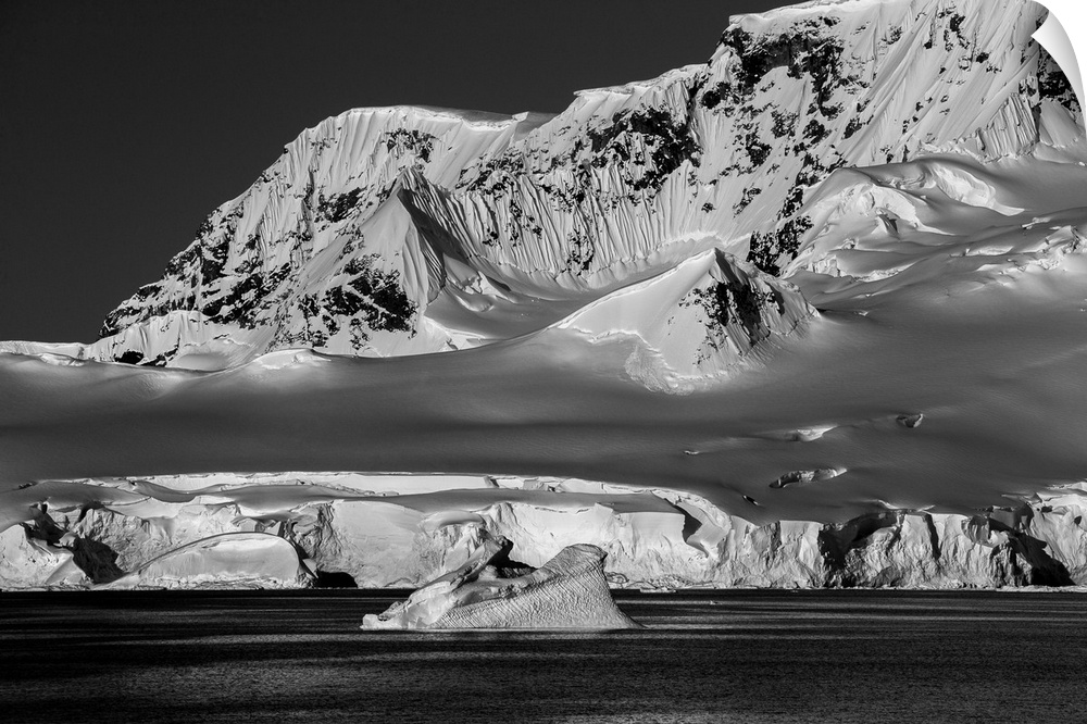 Black and white photograph of the cold and lifeless looking landscape of Antarctica.