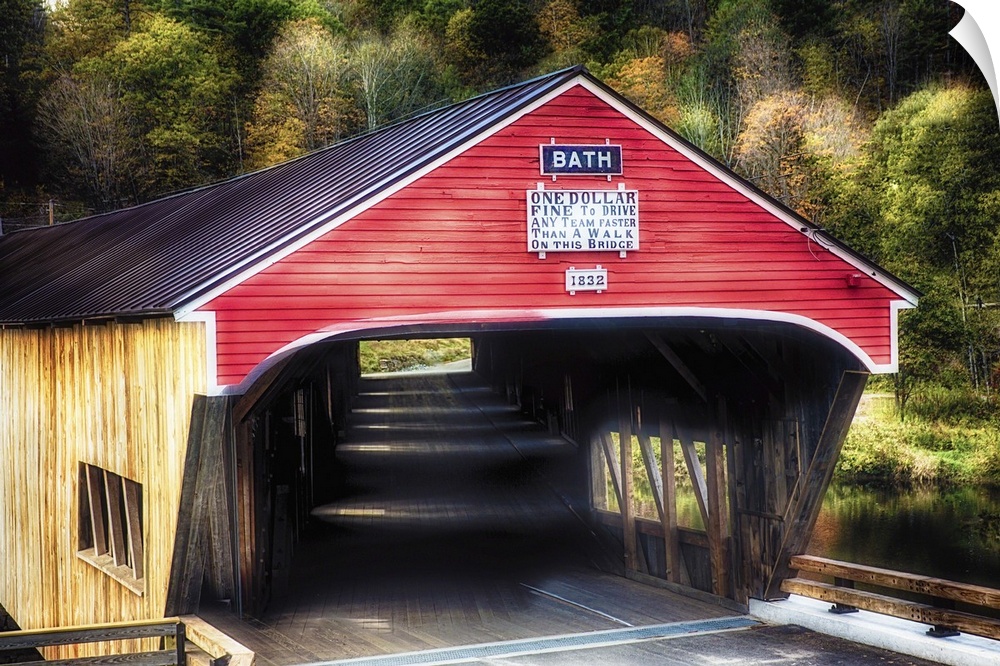 Photograph of a red covered bridge.