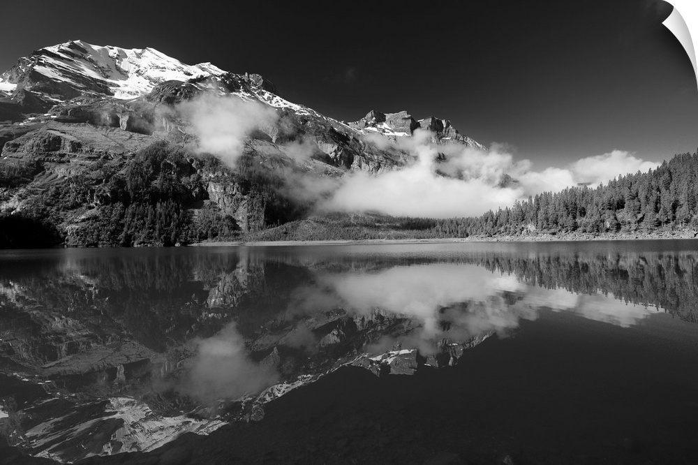 Mountain landscape is reflected in a beautiful lake