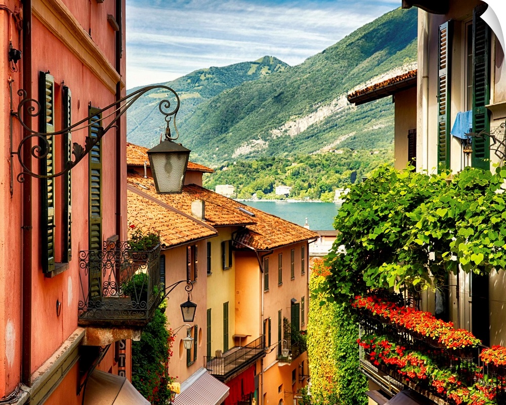 Fine art photo of the roofs of shops in a European city, looking to the lake below.