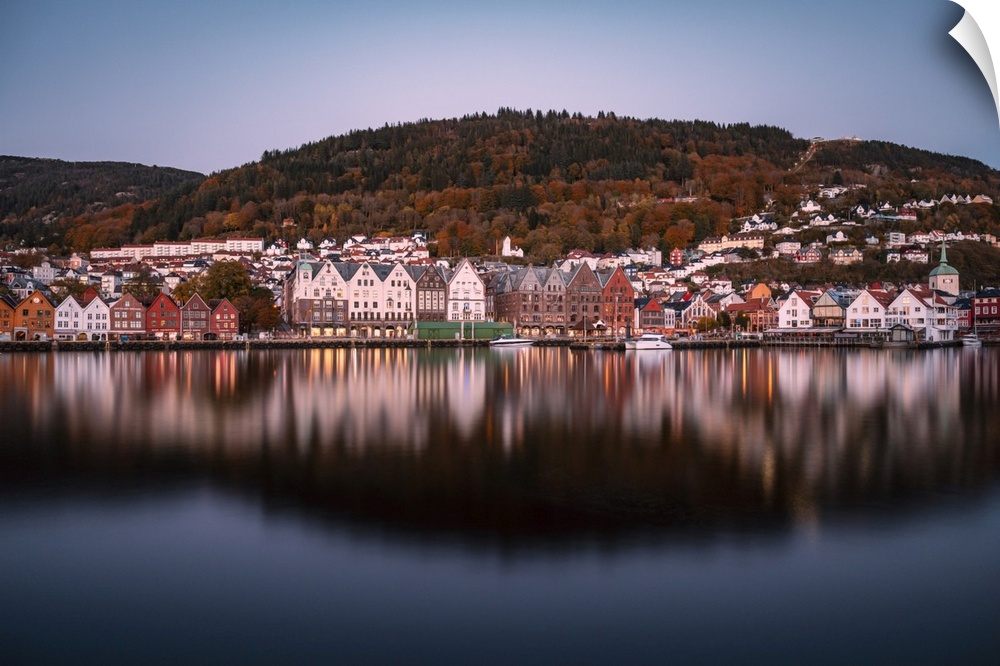 Long exposure of the evening harbor of Bergen, namely the city of seven mountains in Norway, with UNESCO Bryggen at the wa...