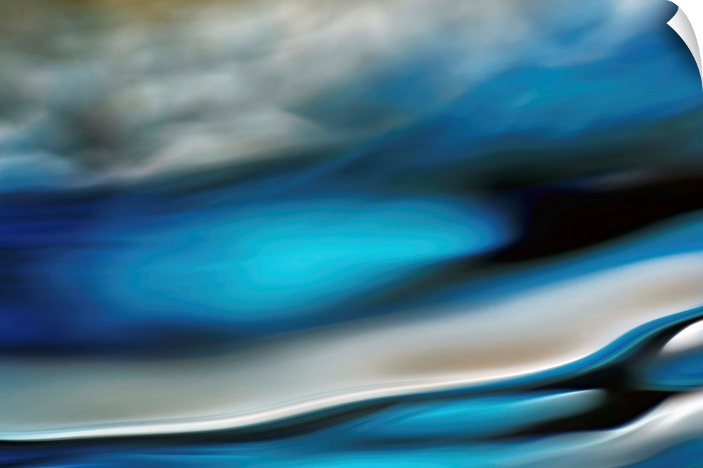 Abstract photo of smooth waves in cool tones.