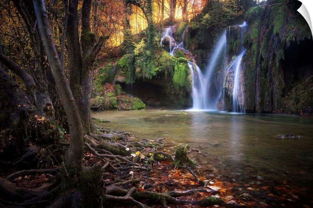 Fine art photograph of a waterfall in a forest in France.