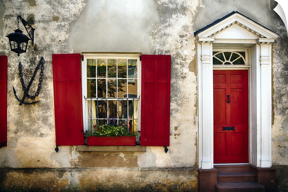 Entrance View of a Historic House in Charleston, with Bright Red Door