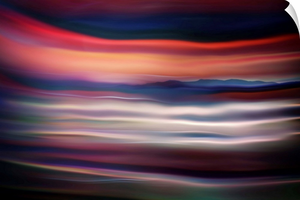 Abstract photograph of blurred and blended colors and flowing lines.