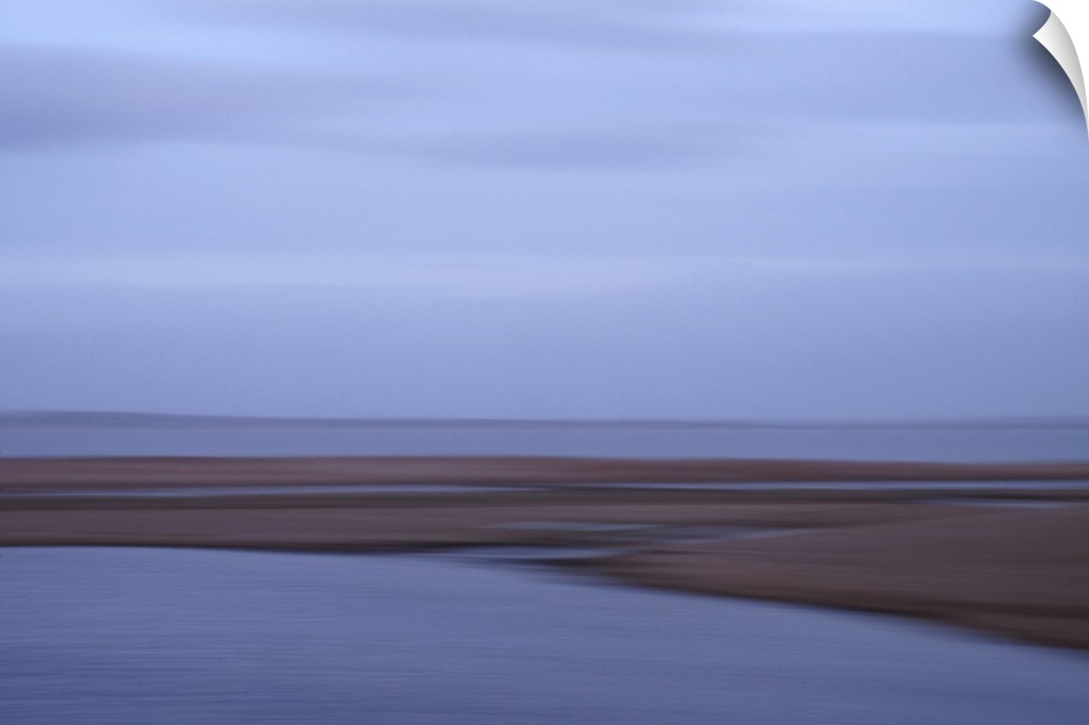 Artistically blurred photo. Winter view on the lake Flade So in Denmark, late in the afternoon after a rain storm.