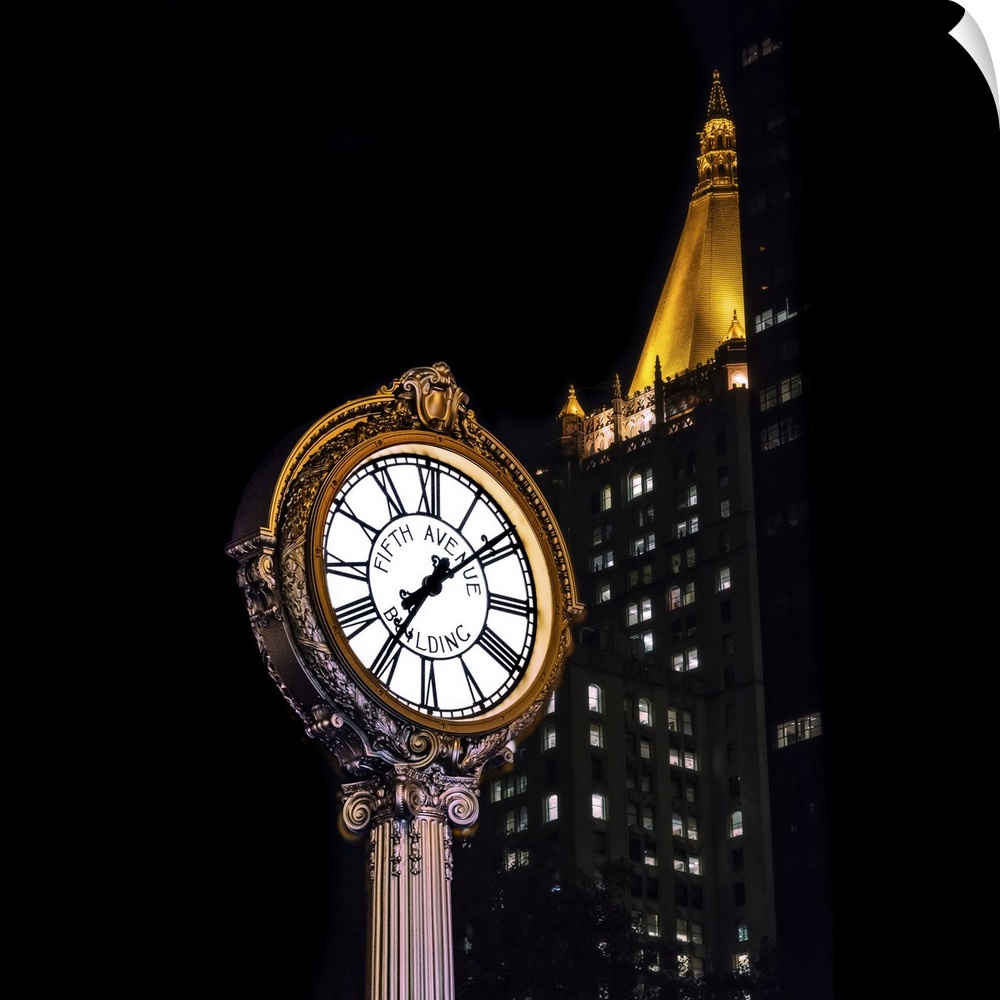 On New York City Manhattan's Fifth Avenue, an ornate lit white Roman numeral clock with golden glints surrounding its face...