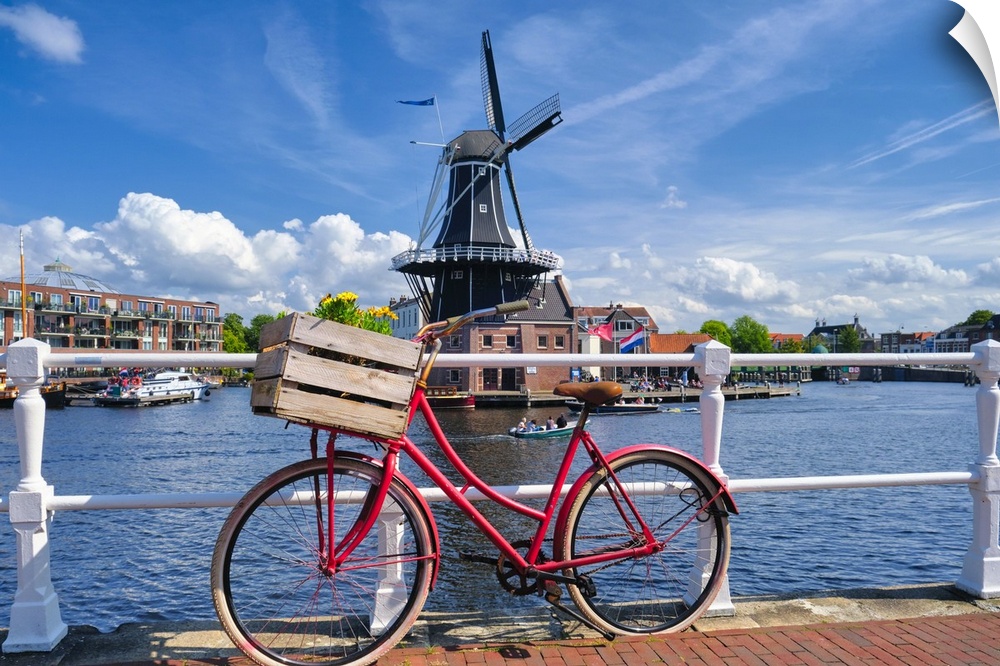 Old Bicycle on the Bridge with the De Adriaan Wndmill in the Background, Haarlem; The Netherlands