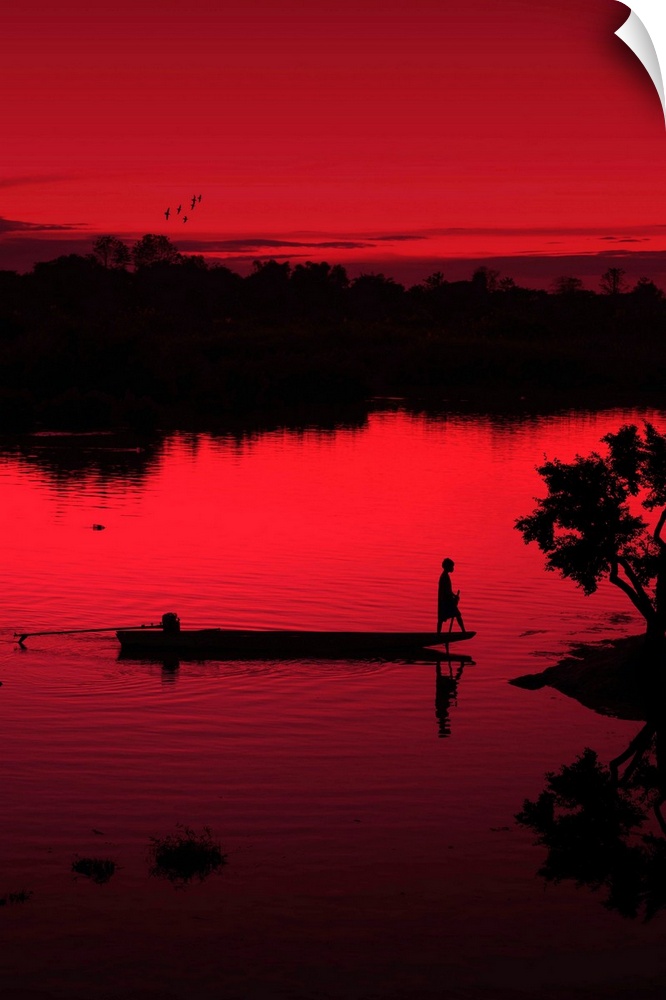 A boat on the Mekong photographed with a red filter