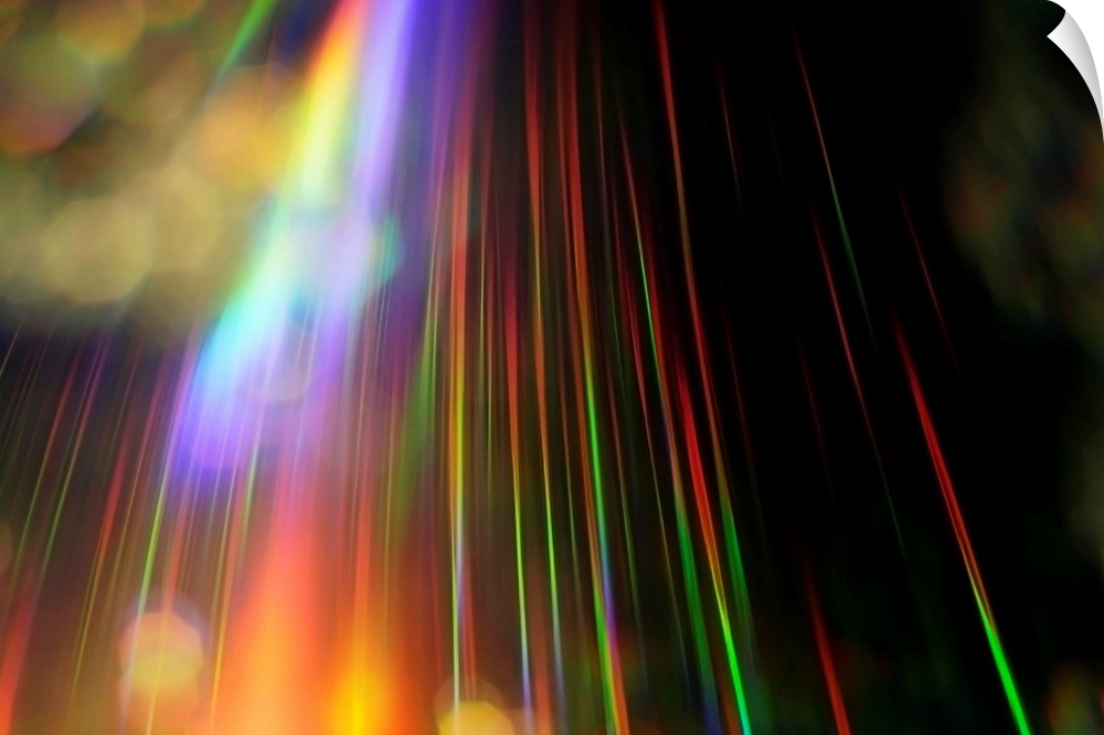 An abstract piece with a rainbow of colors streaking vertically on the print against a black background.