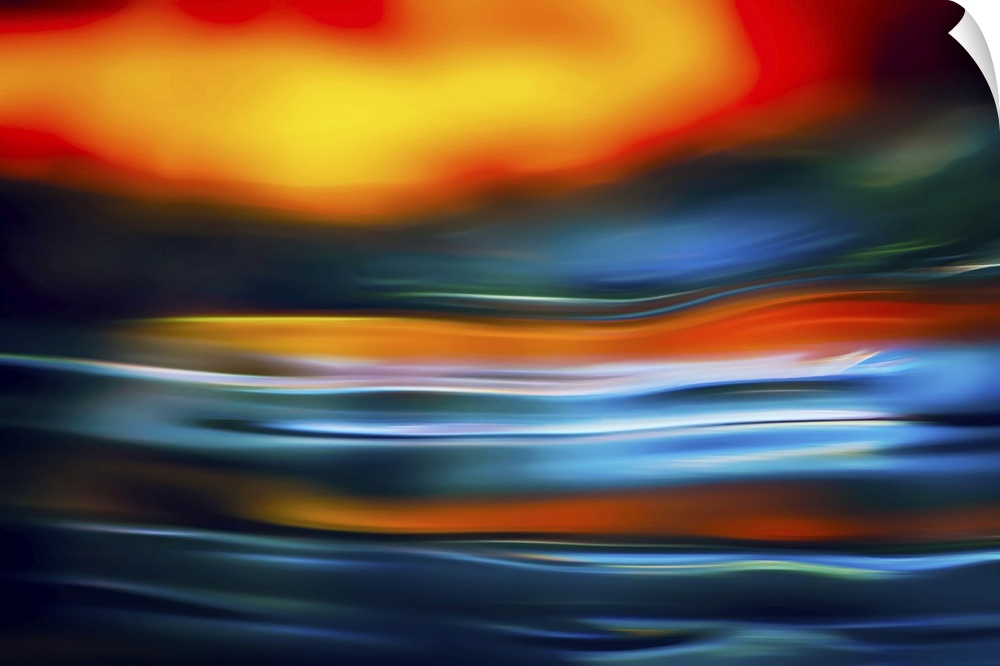 Studio shot of water reflecting colors. This is an abstract representation or impression of a dramatic sunset, when it loo...