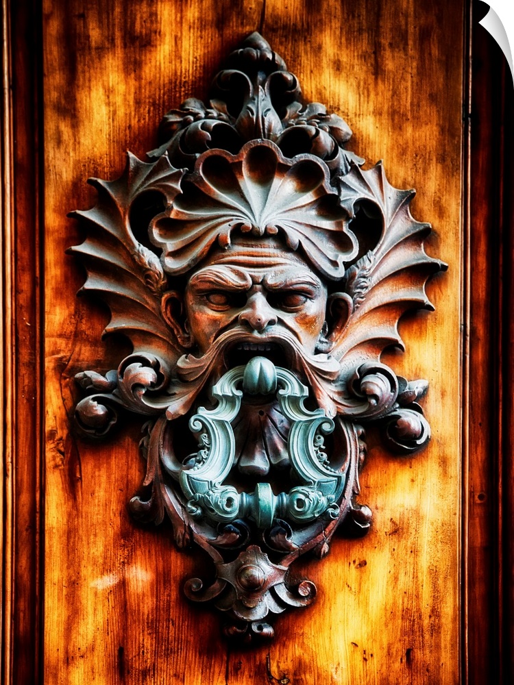 Close Up View of a Angry Man Face Door Knocker, Florence, Tuscany, Italy.