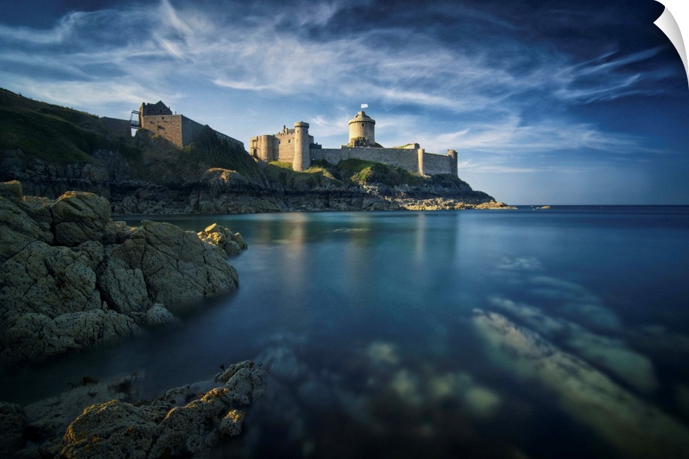 Classical view of a castle facing the sea and the rock, the place of Fort la Latte, in Brittany in France.