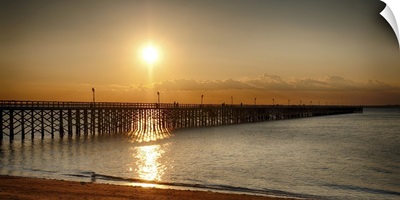 Golden Sunlight over a Wooden Pier